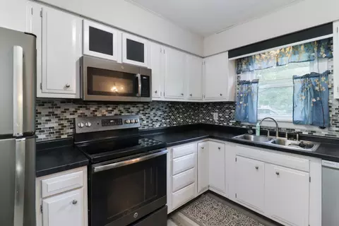 Kitchen - 409 Elm St, Le Roy, IL 61752 photo 2 of 3