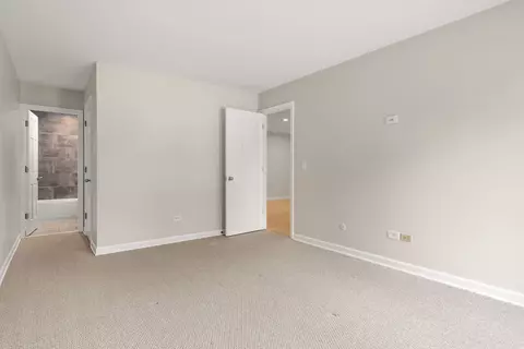 Bedroom - 1575 Sandpebble Dr #217, Wheeling, IL 60090 photo 3 of 5