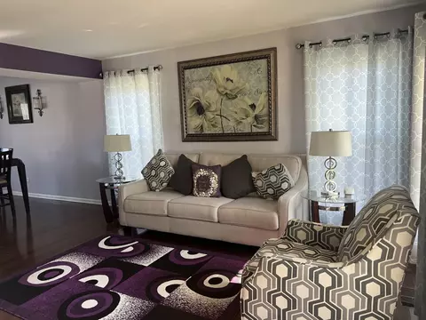 Living - 671 Woodbridge Dr, Elgin, IL 60124 photo 1 of 3
