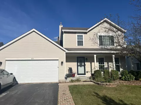 Exterior - 671 Woodbridge Dr, Elgin, IL 60124 photo 2 of 5