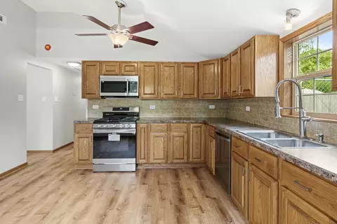 Kitchen - 3435 Morgan St, Steger, IL 60475 photo 2 of 4