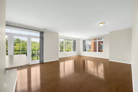 Living - 640 Mchenry Rd #208, Wheeling, IL 60090 photo 1 of 3