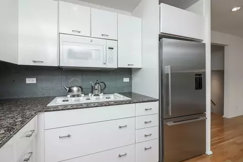 Kitchen - 1000 Woodview Rd, Burr Ridge, IL 60527 photo 2 of 3