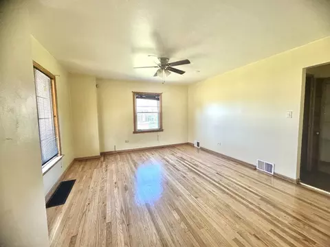 Living - 103 E 151st St, Harvey, IL 60426 photo 1 of 5