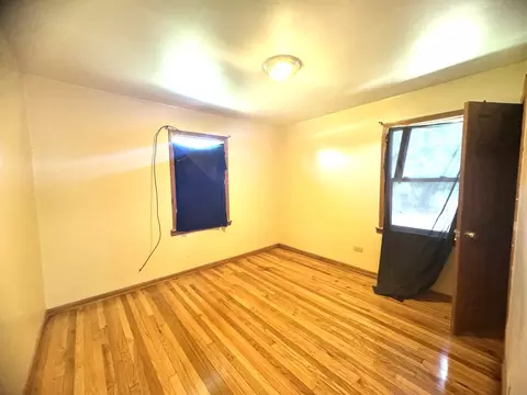 Bedroom - 103 E 151st St, Harvey, IL 60426 photo 1 of 6