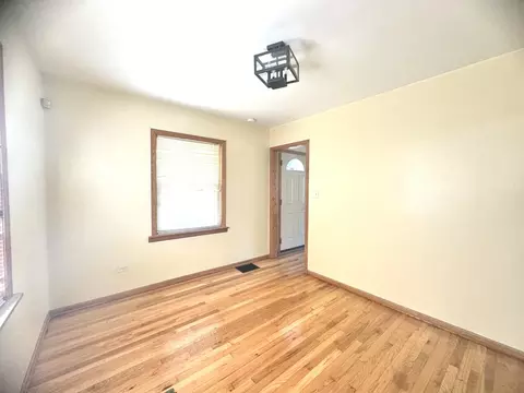 Living - 103 E 151st St, Harvey, IL 60426 photo 5 of 5