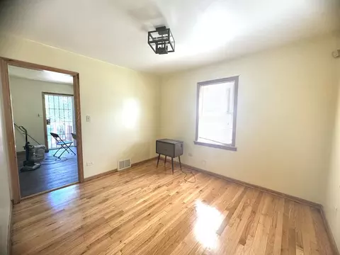Living - 103 E 151st St, Harvey, IL 60426 photo 4 of 5