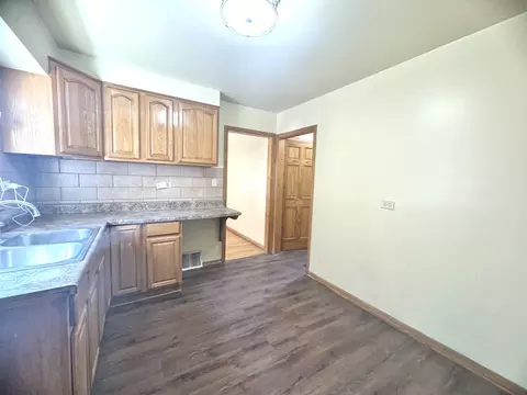 Kitchen - 103 E 151st St, Harvey, IL 60426 photo 1 of 3