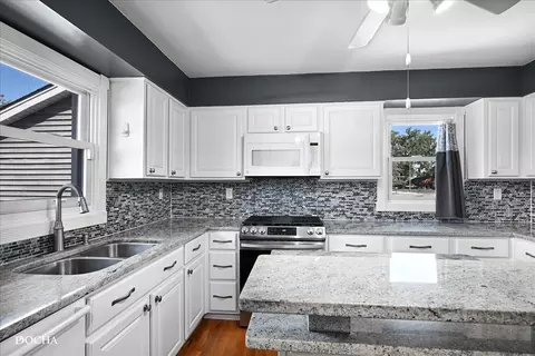 Kitchen - 7400 Beloit Ave, Bridgeview, IL 60455 photo 1 of 2