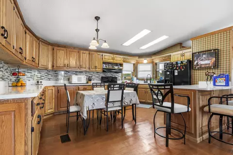 Kitchen - 4524 E River Rd, Ridott, IL 61067 photo 1 of 2