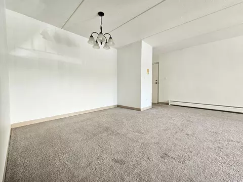Living - 563 Fairway View Dr #2E, Wheeling, IL 60090 photo 2 of 2