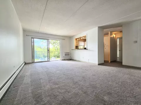 Living - 563 Fairway View Dr #2E, Wheeling, IL 60090 photo 1 of 2