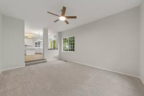 Living - 1749 Melbourne Ln, Aurora, IL 60503 photo 4 of 5