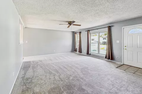 Living - 64 Schoenbeck Rd, Wheeling, IL 60090 photo 1 of 3