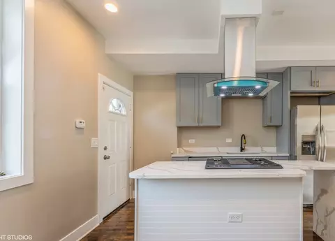 Kitchen - 10718 S Champlain Ave, Chicago, IL 60628 photo 1 of 8