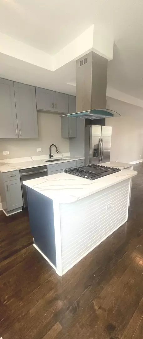 Kitchen - 10718 S Champlain Ave, Chicago, IL 60628 photo 7 of 8