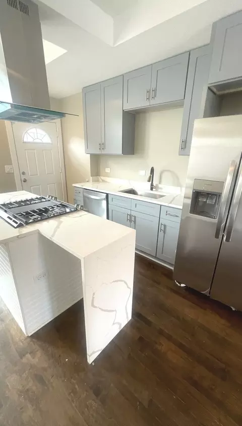 Kitchen - 10718 S Champlain Ave, Chicago, IL 60628 photo 5 of 8