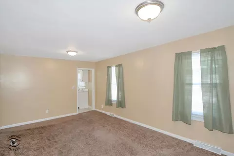 Living - 209 White Ave, Joliet, IL 60433 photo 1 of 4