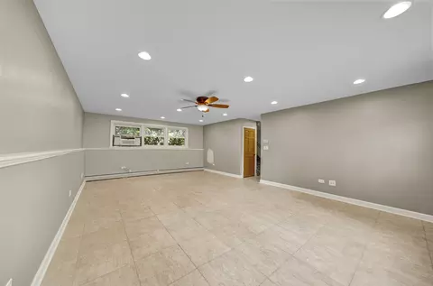 Living - 1733 E Algonquin Rd, Des Plaines, IL 60016 photo 6 of 6