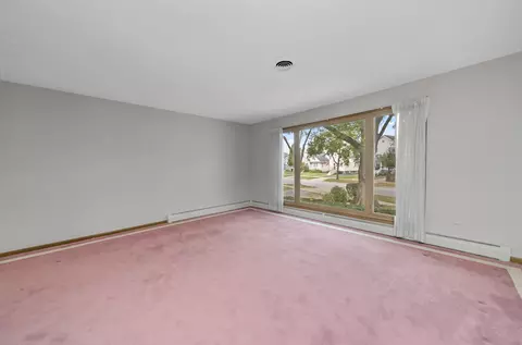 Living - 1733 E Algonquin Rd, Des Plaines, IL 60016 photo 2 of 6