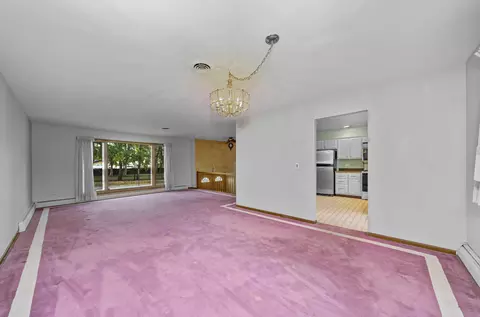 Living - 1733 E Algonquin Rd, Des Plaines, IL 60016 photo 4 of 6