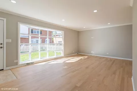 Living - 8842 Dee Rd #B, Des Plaines, IL 60016 photo 2 of 7