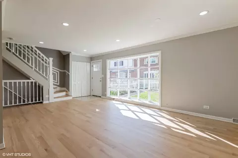 Living - 8842 Dee Rd #B, Des Plaines, IL 60016 photo 1 of 7