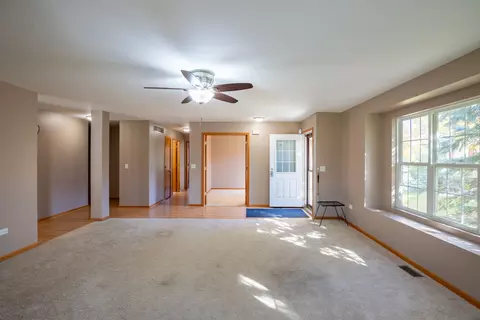 Living - 5603 W Sutton Pl #A, Monee, IL 60449 photo 3 of 3