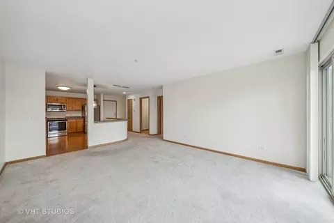 Living - 27 E Hattendorf Ave #415, Roselle, IL 60172 photo 2 of 2