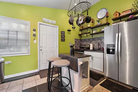 Kitchen - 1215 E 85th St, Chicago, IL 60619 photo 1 of 2