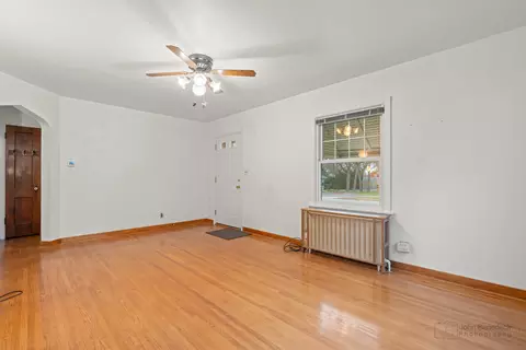 Living - 330 Mcclure Ave, Elgin, IL 60123 photo 2 of 2