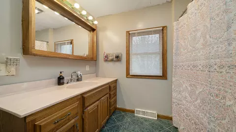 Bath - 101 E 2nd St, Leaf River, IL 61047 photo 2 of 2