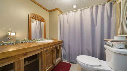 Bath - 101 E 2nd St, Leaf River, IL 61047 photo 1 of 2