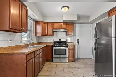 Kitchen - 256 E 148th St, Harvey, IL 60426 photo 1 of 4
