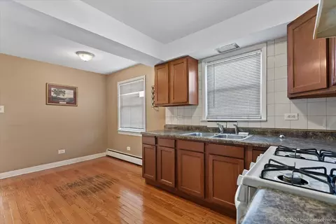 Kitchen - 256 E 148th St, Harvey, IL 60426 photo 3 of 4