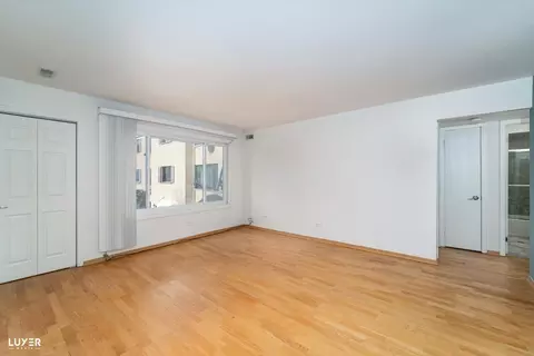 Living - 9340 Hamilton Ct #E, Des Plaines, IL 60016 photo 4 of 4