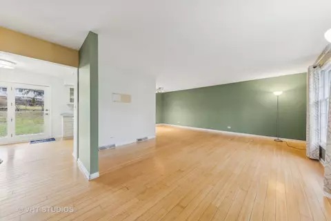 Living - 117 W Bailey Rd, Naperville, IL 60565 photo 2 of 4