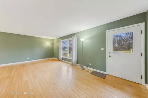 Living - 117 W Bailey Rd, Naperville, IL 60565 photo 1 of 4