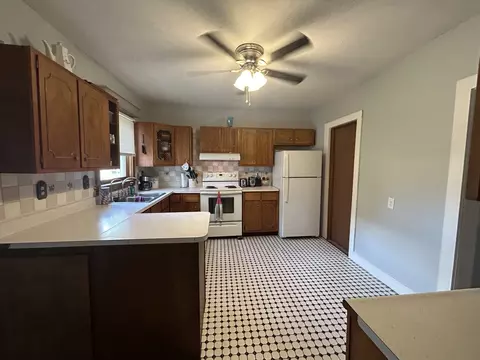 Kitchen - 220 E Monroe St, Waterman, IL 60556 photo 1 of 2