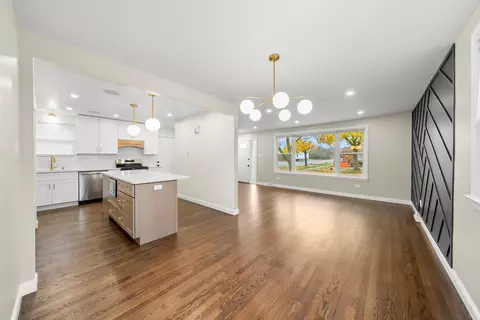 Living - 164 E 122nd St, Chicago, IL 60628 photo 3 of 4