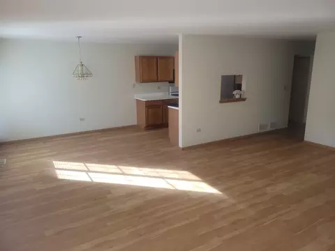 Living - 1722 Willow Circle Dr, Crest Hill, IL 60403 photo 2 of 5