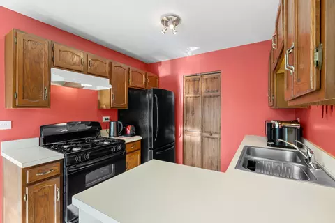 Kitchen - 713 Crescent Ct #C2, Bartlett, IL 60103 photo 2 of 2