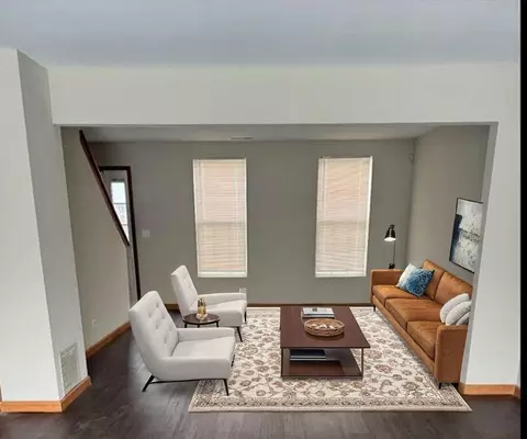 Living - 1009 Symphony Dr, Aurora, IL 60504 photo 1 of 2