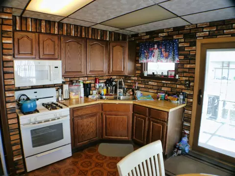 Kitchen - 7608 S Thomas Ave, Bridgeview, IL 60455 photo 2 of 2