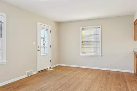Living - 1431 E Algonquin Rd, Des Plaines, IL 60016 photo 5 of 7