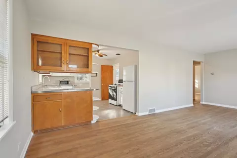 Living - 1431 E Algonquin Rd, Des Plaines, IL 60016 photo 6 of 7