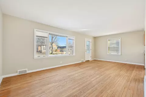 Living - 1431 E Algonquin Rd, Des Plaines, IL 60016 photo 2 of 7