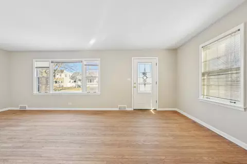 Living - 1431 E Algonquin Rd, Des Plaines, IL 60016 photo 4 of 7