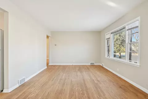 Living - 1431 E Algonquin Rd, Des Plaines, IL 60016 photo 3 of 7