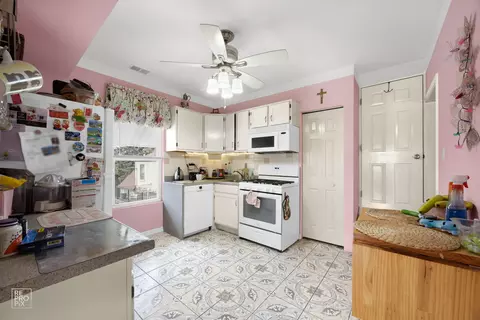 Kitchen - 50 E 155th St, Harvey, IL 60426 photo 2 of 2